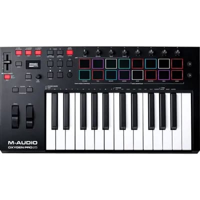 M-audio Oxygen Pro Mini - Contrôleur Midi - Usb - 32 Touches - 8 Pads De Batterie